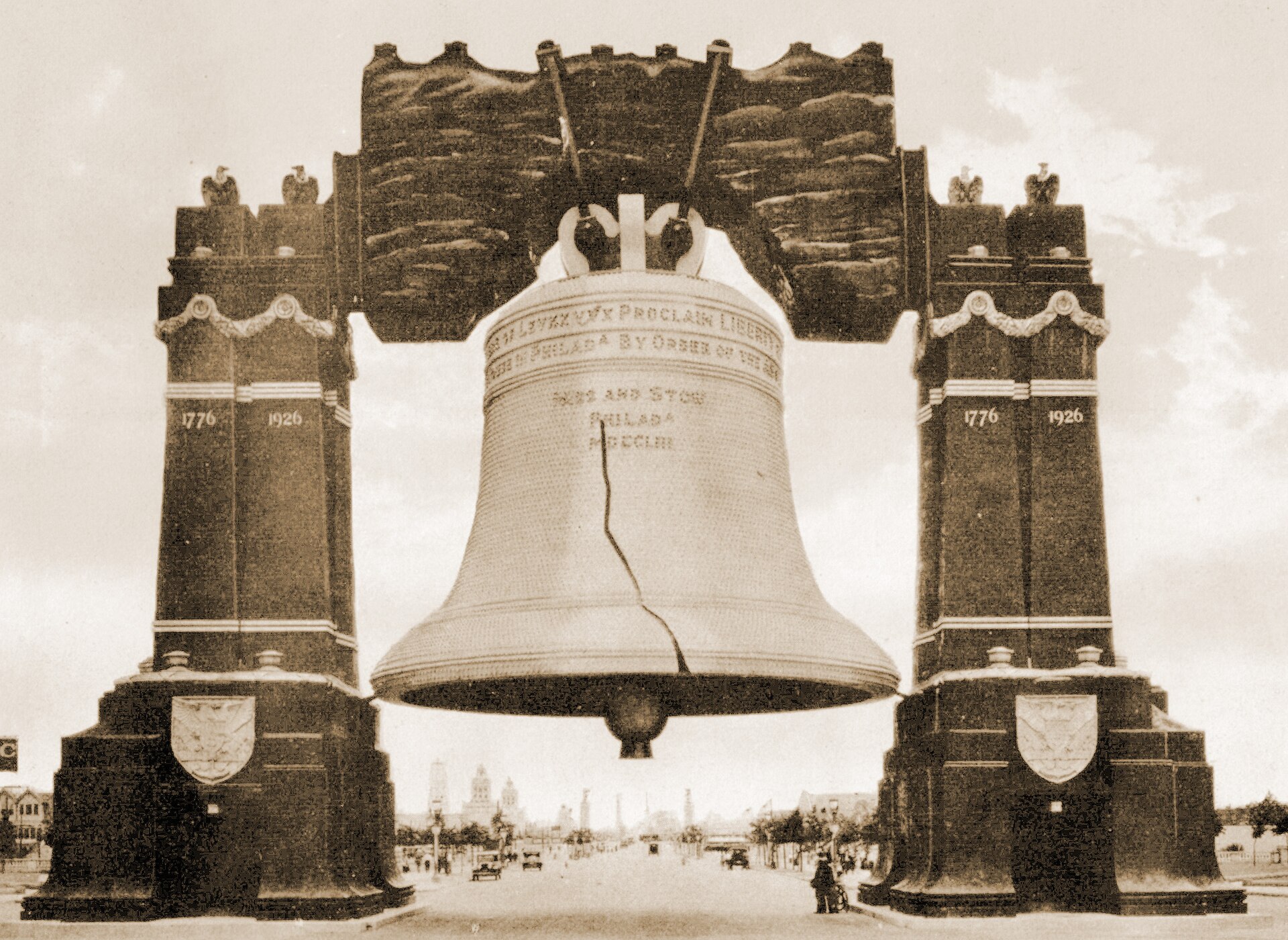The 80-foot tall Luminous Liberty Bell spanning Broad Street at the 1926 Sesqui-Centennial International Exposition in Philadelphia, lit with 26,000 light bulbs