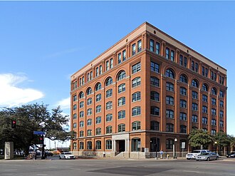 The former Texas School Book Depository building, now the Dallas County Administration Building and home to the Sixth Floor Museum at Dealey Plaza