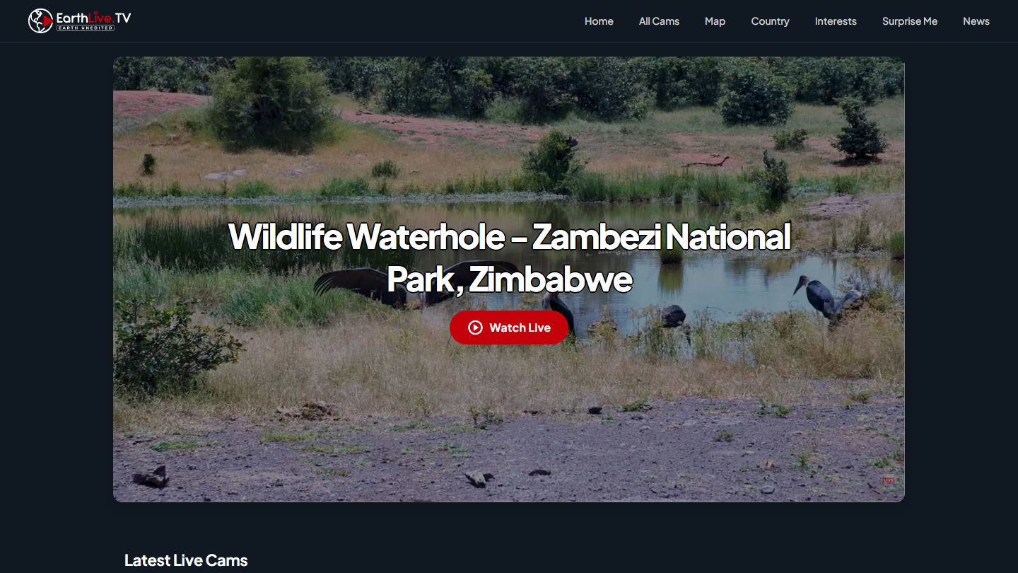 Screenshot of the EarthLive.TV homepage featuring a wildlife waterhole live stream from Zambezi National Park, Zimbabwe, with the top navigation showing All Cams / Place / Country / Interests / Surprise Me