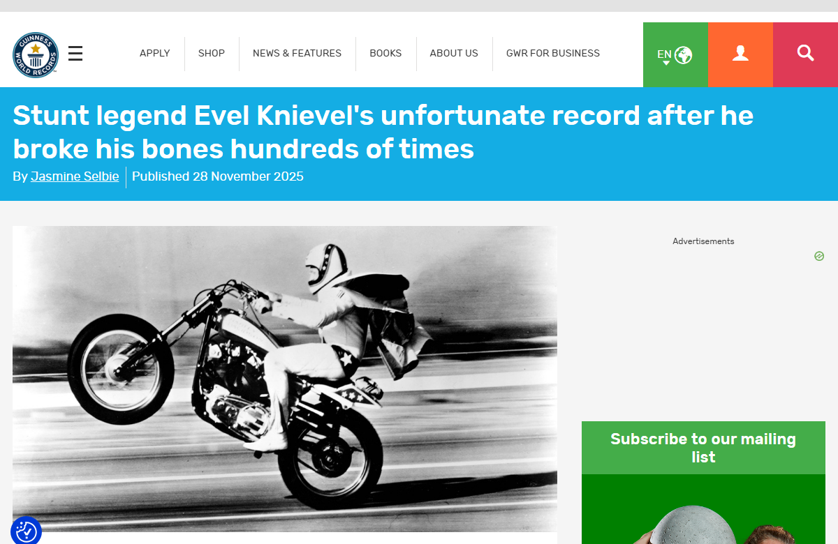 Guinness World Records article with a black-and-white photo of Evel Knievel popping a wheelie on his motorcycle