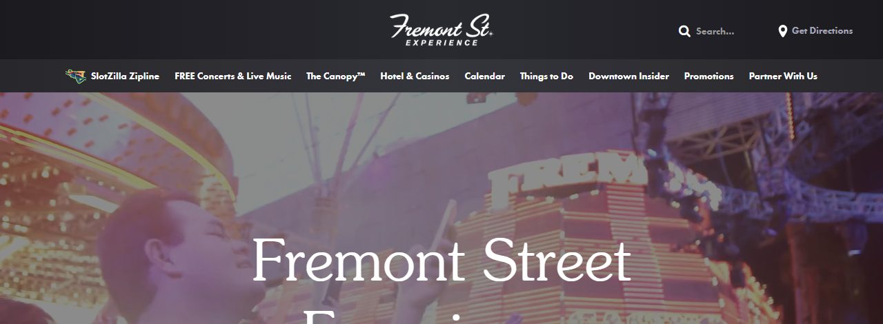 Fremont Street Experience's own homepage, showing a crowd gathered under the Viva Vision LED canopy in downtown Las Vegas