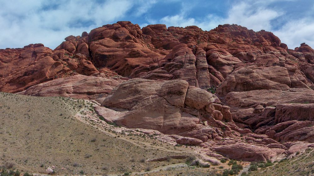A panoramic view of the striped, multicolored Calico Hills sandstone formations at Red Rock Canyon National Conservation Area