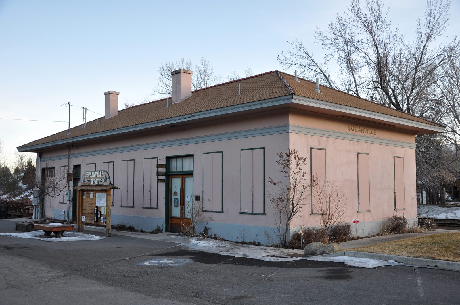 The historic Susanville Railroad Depot in Susanville, California, a single-story stuccoed building with a hipped roof