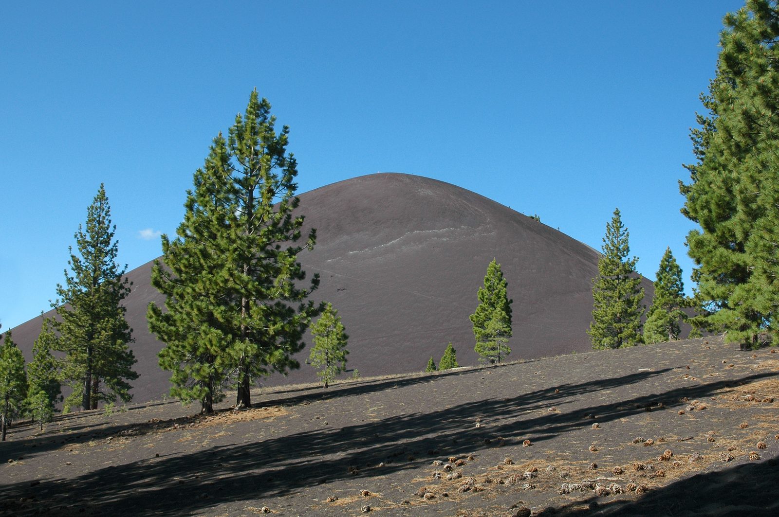 Cinder Cone, a symmetrical volcanic cone rising above the Fantastic Lava Beds at Lassen Volcanic National Park in California