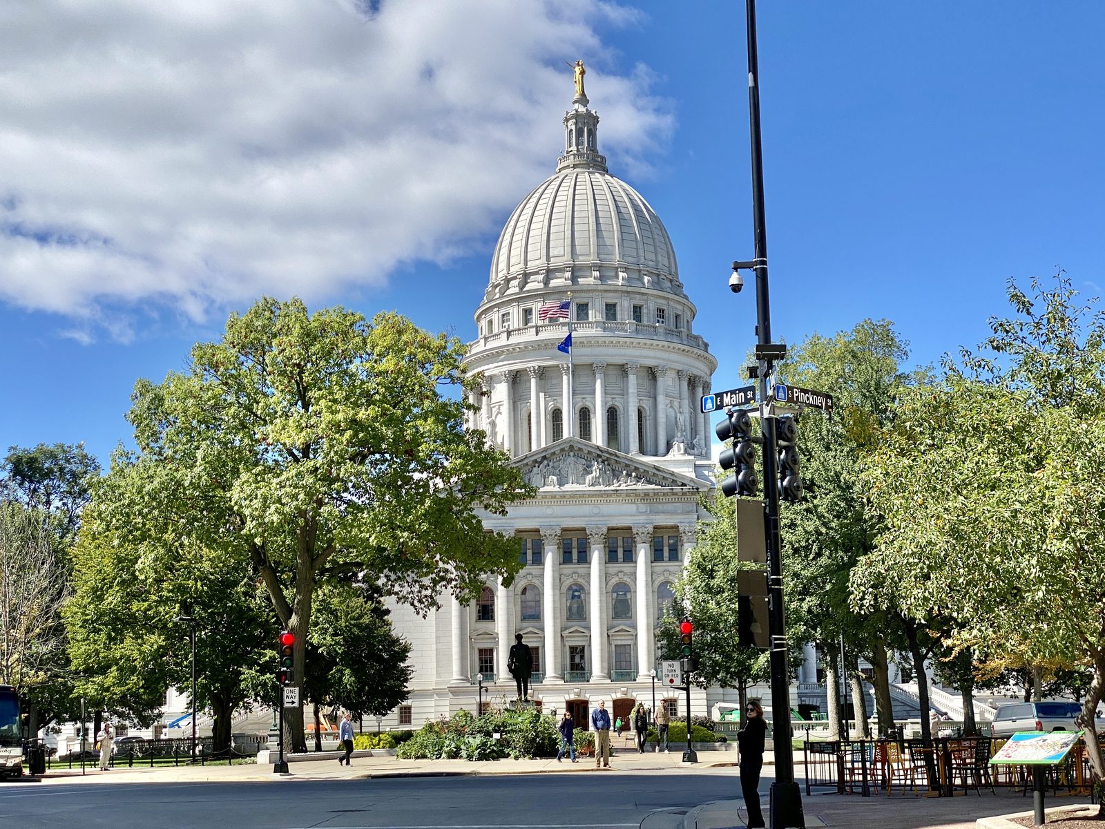 The Wisconsin State Capitol building in Madison, a domed government building seen from Capitol Square