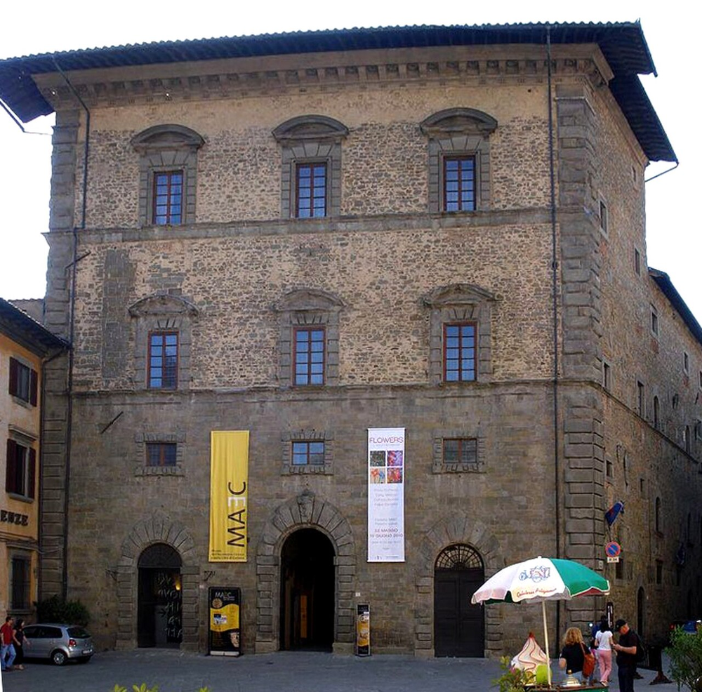Wikipedia's Museo dell'Accademia Etrusca article showing a photo of the museum's stone facade at Palazzo Casali in Cortona's historic center