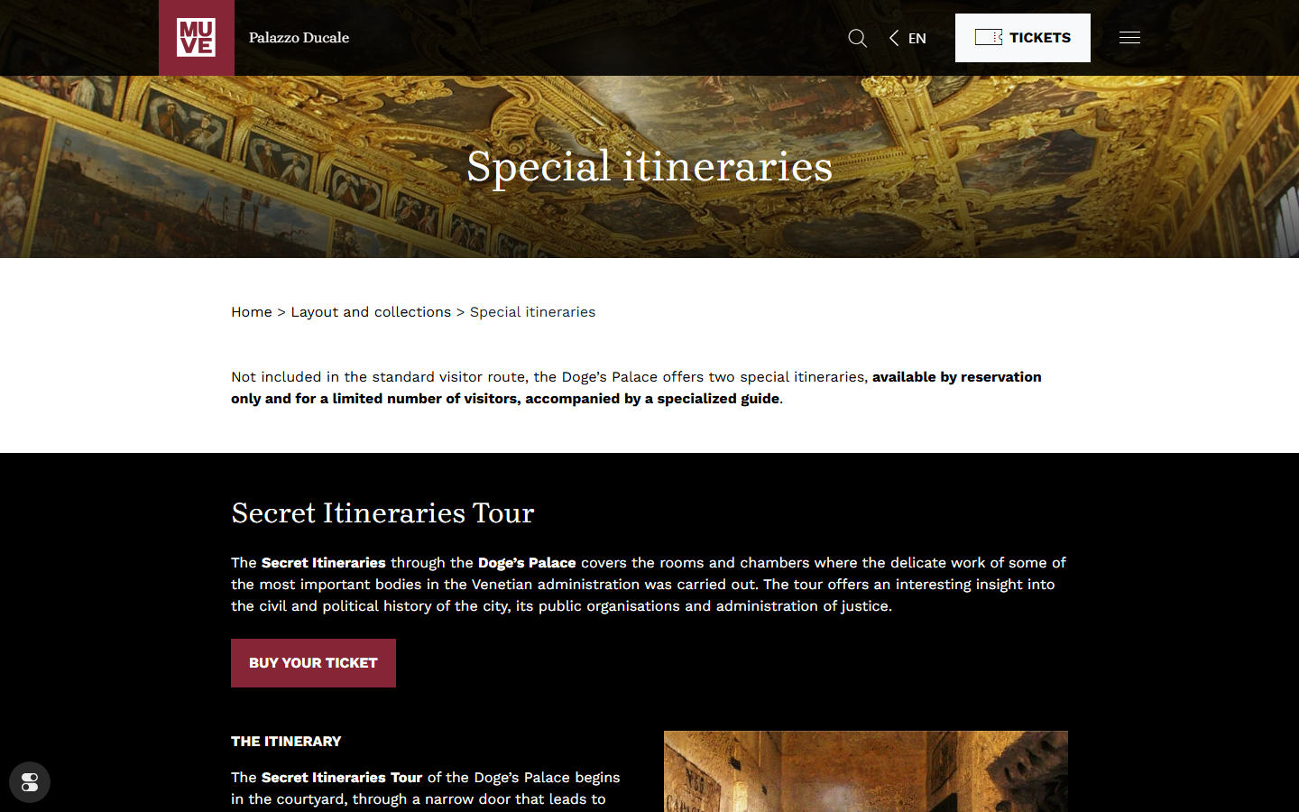 The Doge's Palace official visiting page for the Secret Itineraries Tour, showing a photo of a narrow attic passage lined with wooden beams leading toward the former prison cells